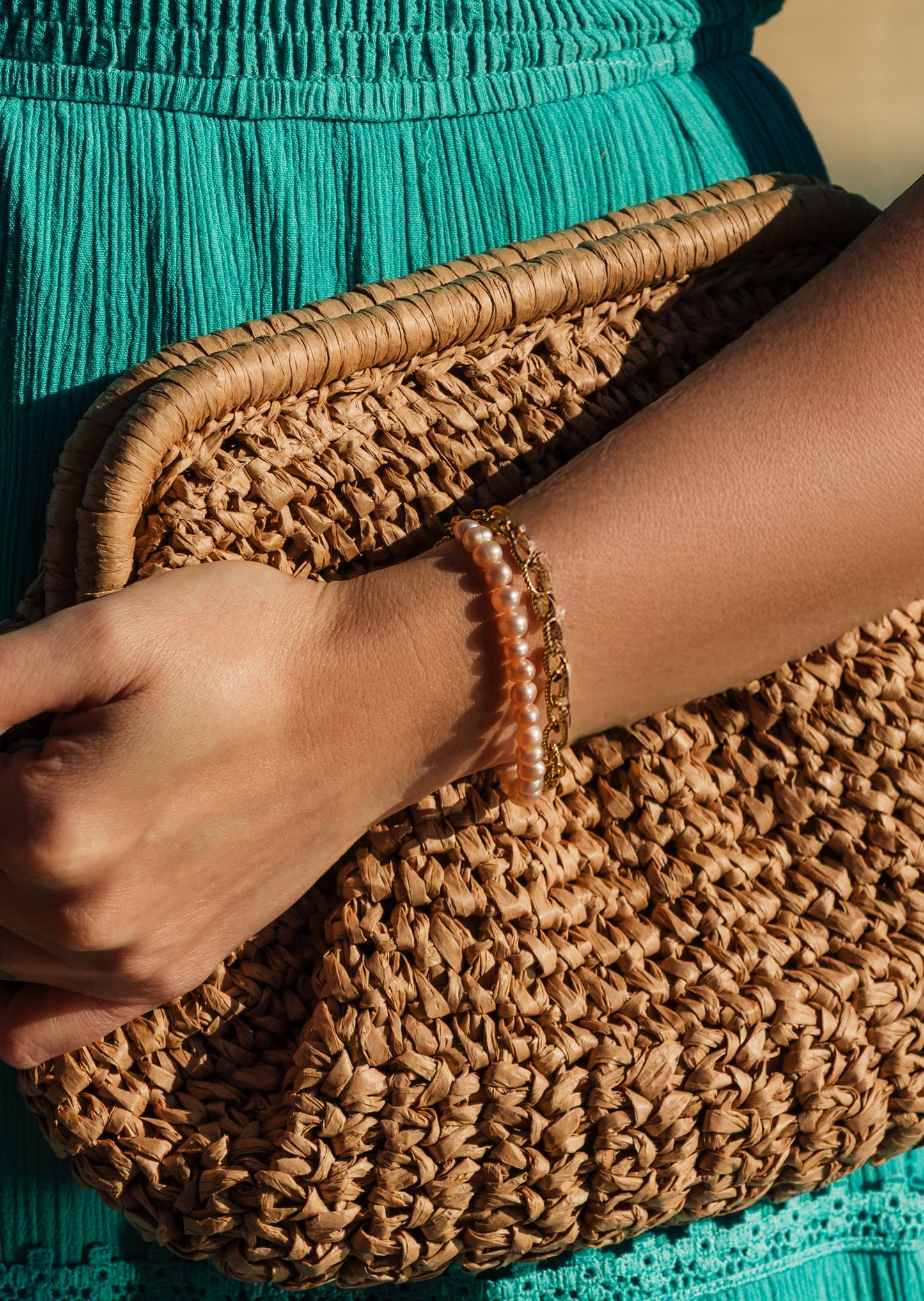 Golden Light Bracelet layered with other gold chains – Charlotte’s Cove Island Dreams Collection.