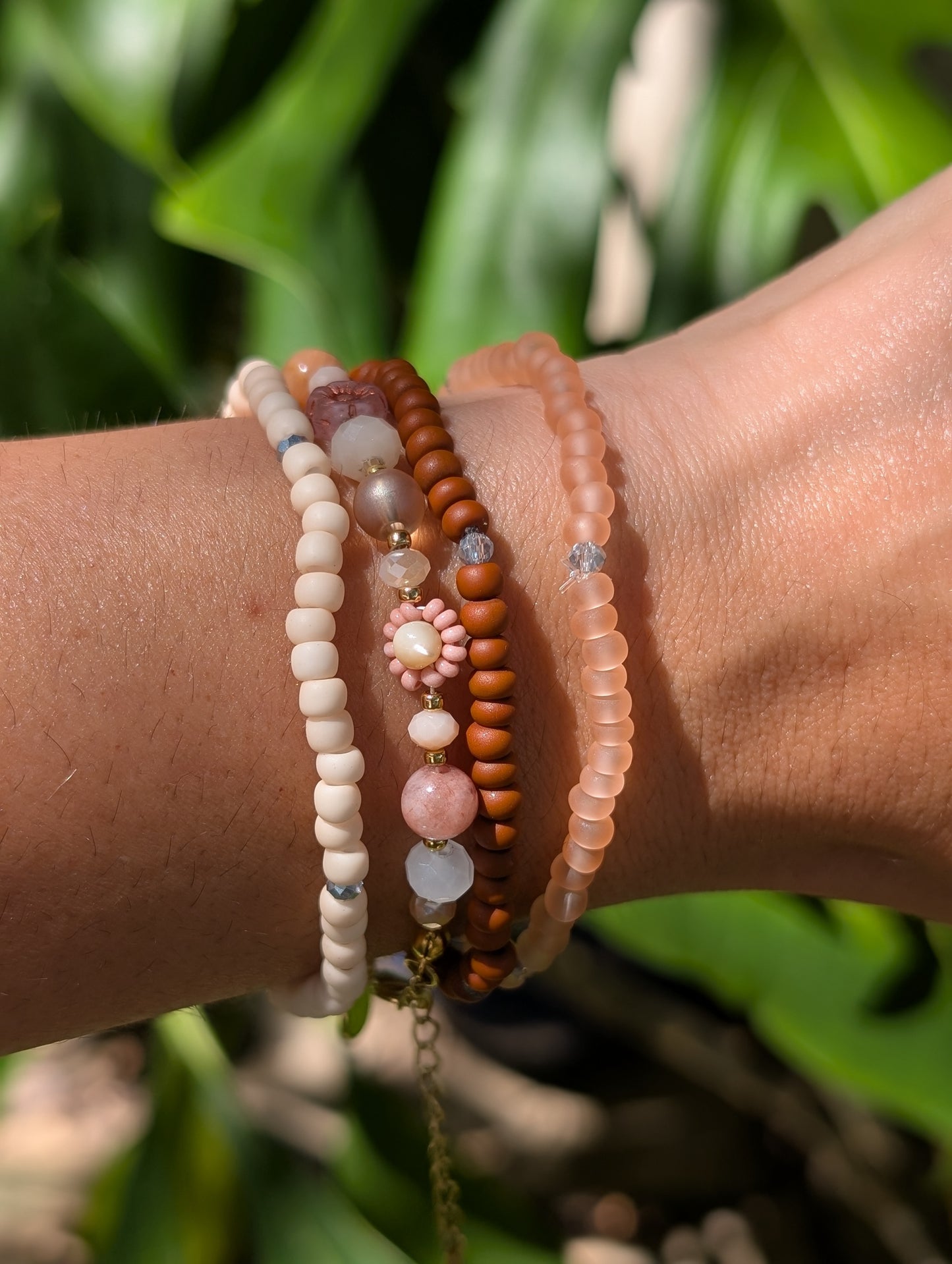 “Sunburnt Glow beaded bracelet stacked with other Sparkle Stacklers – Cappa Creations fall collection.”