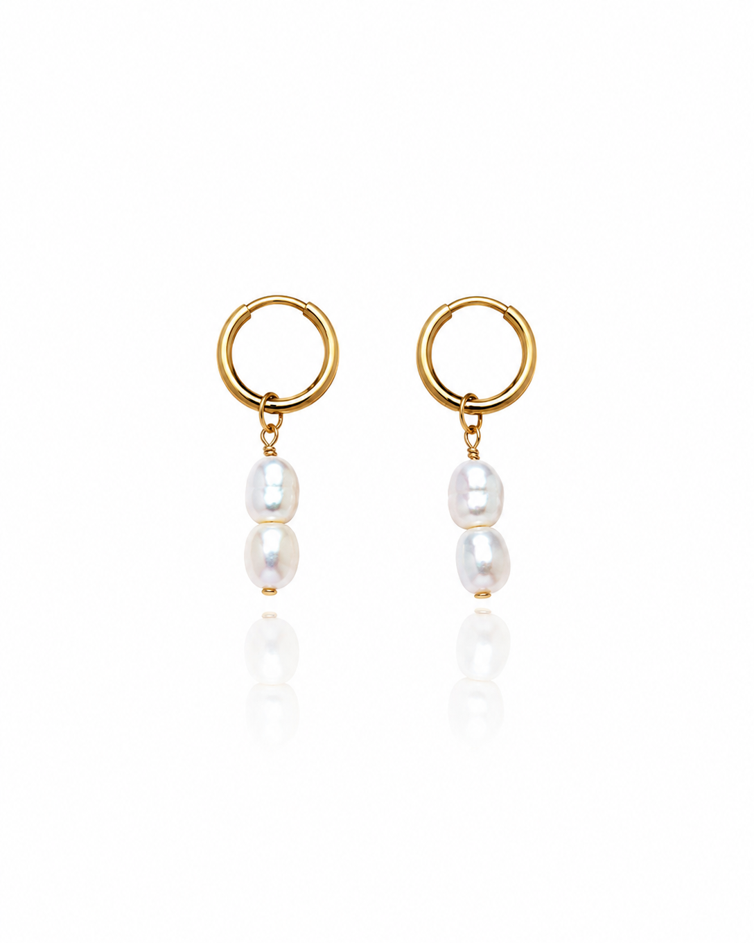 Salt Air Pearl Earrings with genuine freshwater pearl drops suspended from petite 18K gold PVD hoops