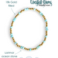 Bracelet with gold and larimar beads on a white background, featuring 'Coastal Gems Collection' branding.