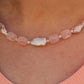 Hand-strung Pink Skies Necklace – lightweight, waterproof, hypoallergenic jewelry.