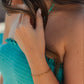 Golden Glow Bracelet layered with coastal gold jewelry – Charlotte’s Cove Island Dreams Collection.