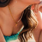 Island Dreams Necklace layered with coastal gold jewelry – Charlotte’s Cove Island Dreams Collection.
