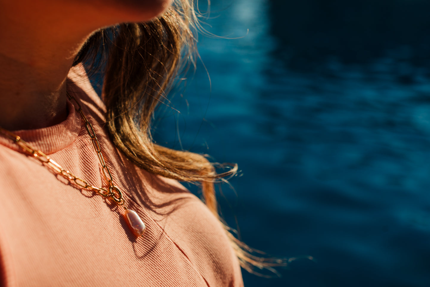 Rosé Resort Necklace worn solo – minimalist pink pearl necklace from Charlotte’s Cove.