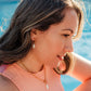 Rosé Resort Earrings worn – minimalist pink pearl huggie earrings from Charlotte’s Cove.