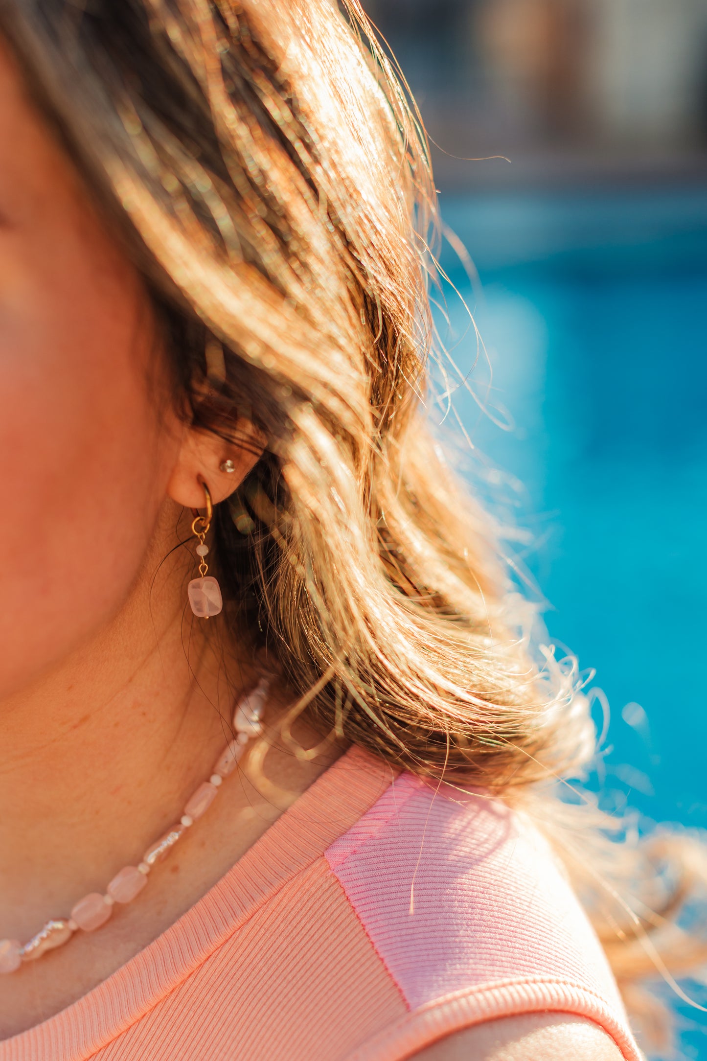 Pink Skies Earrings worn – blush pink gemstone huggie earrings from Charlotte’s Cove.