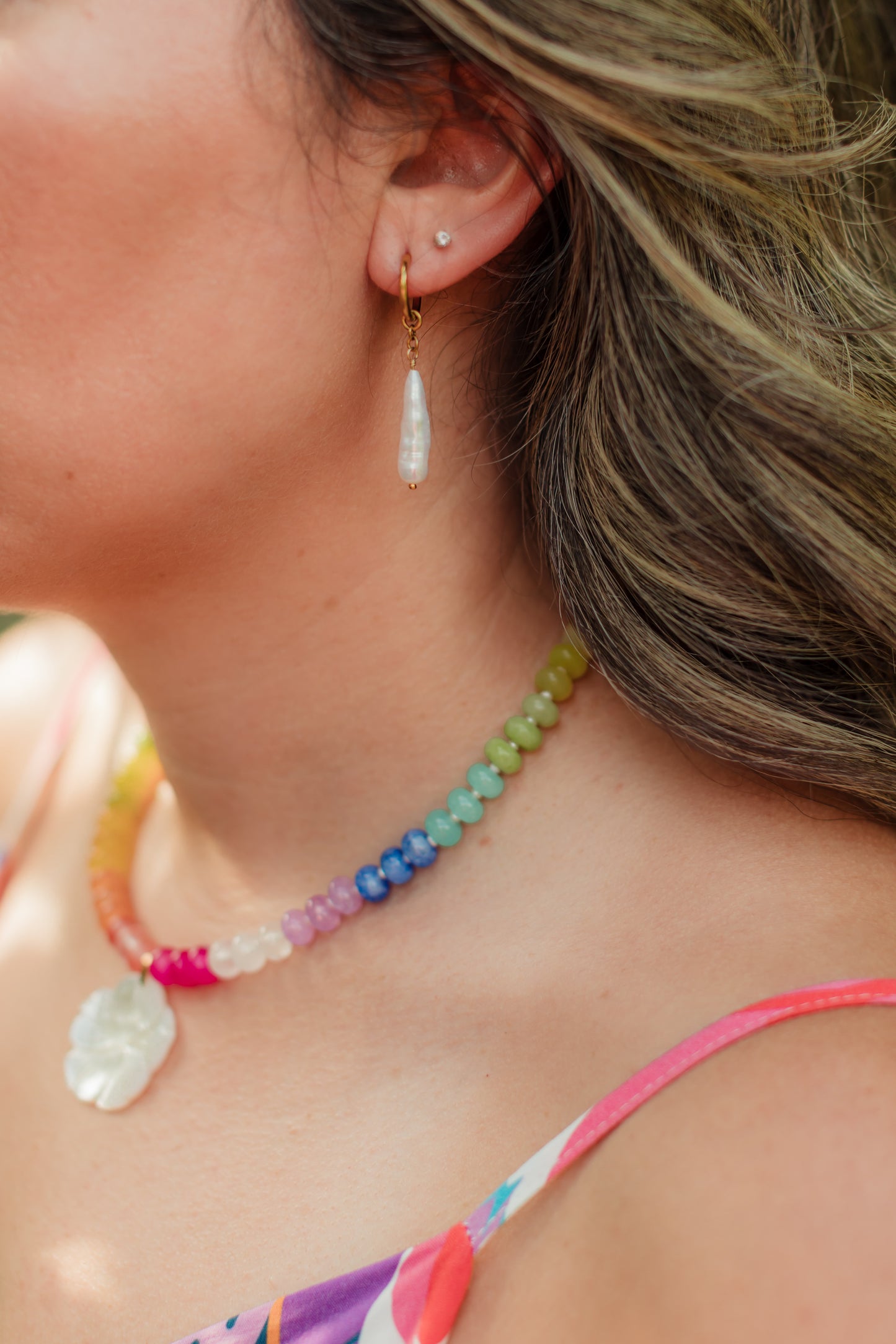 Ocean Pearl Earrings featuring genuine Biwa freshwater stick pearls suspended from polished 18K gold PVD hoop earrings for timeless coastal elegance.