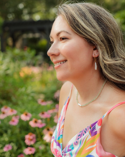 Detailed view of the Island Goddess Necklace with faceted green prehnite and an organic Biwa pearl