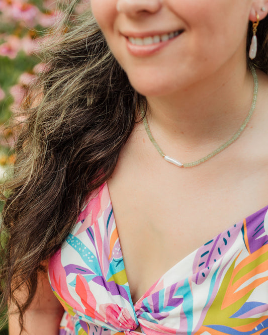 Island Goddess prehnite and pearl necklace styled with an elevated coastal outfit