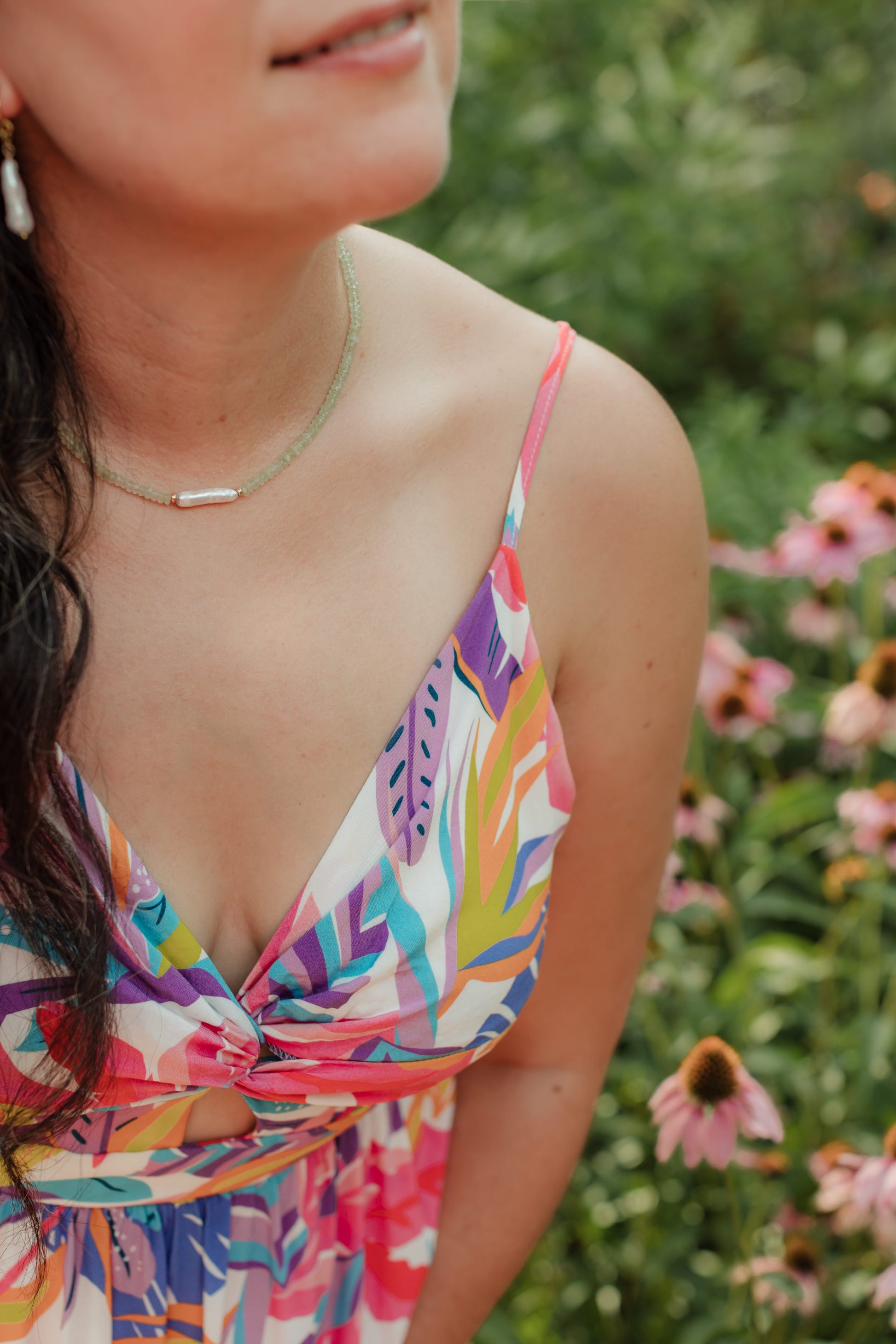 Hand-strung necklace featuring genuine faceted prehnite rondelles with a Biwa baroque freshwater pearl centerpiece and 18K Gold PVD hardware inspired by tropical coastal gardens.