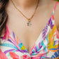 Hand-carved genuine abalone shell flower pendant necklace on an 18K Gold PVD paperclip chain with a removable carabiner clasp.