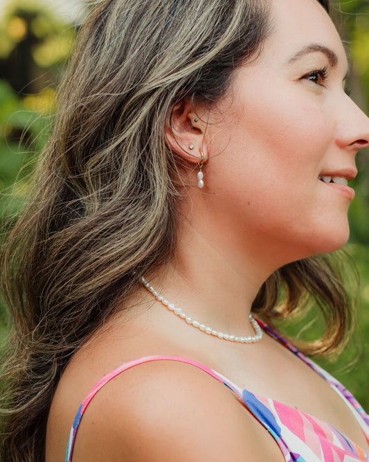 Woman wearing the Salt Air freshwater pearl choker with an effortless coastal jewelry look