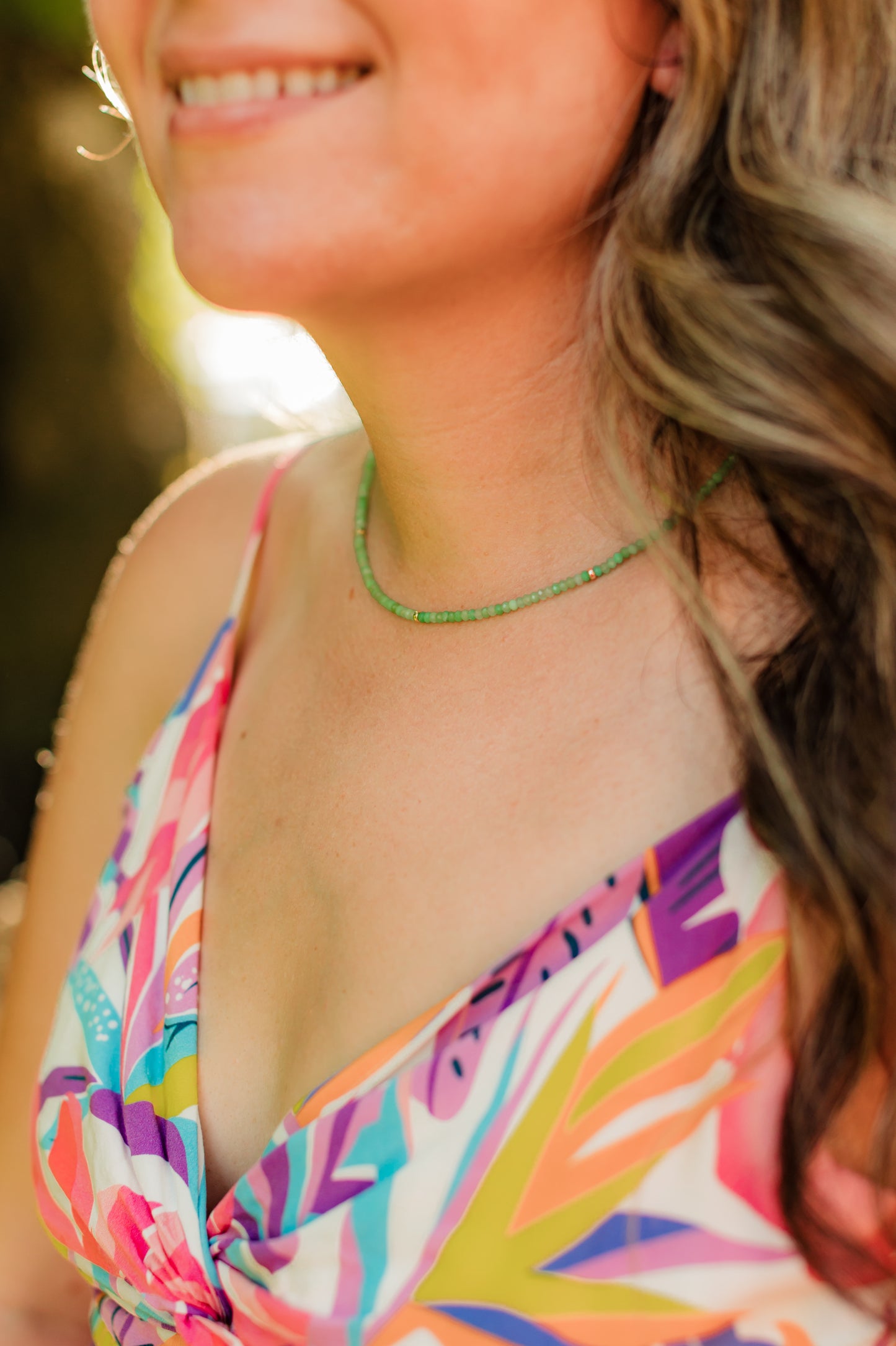 Hand-strung genuine faceted chrysoprase gemstone necklace with 18K Gold PVD accents, inspired by crystal-clear tropical waters and coastal island escapes.