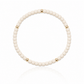 Cream seed bead bracelet with 14K gold-filled accents inspired by warm coastal sand.