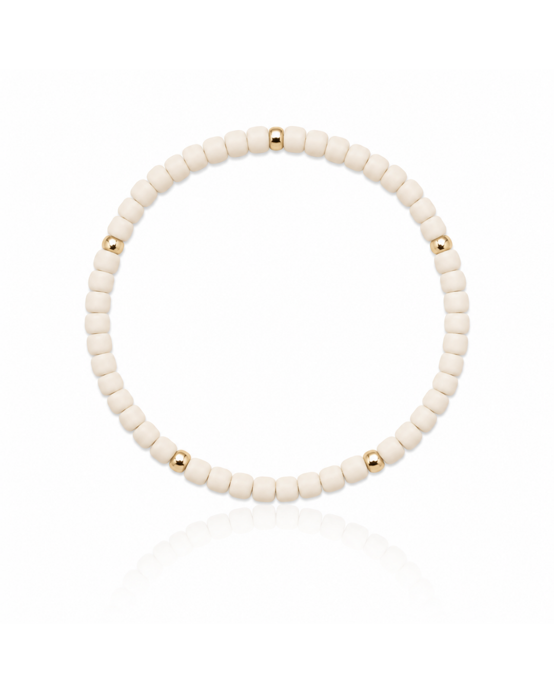 Cream seed bead bracelet with 14K gold-filled accents inspired by warm coastal sand.