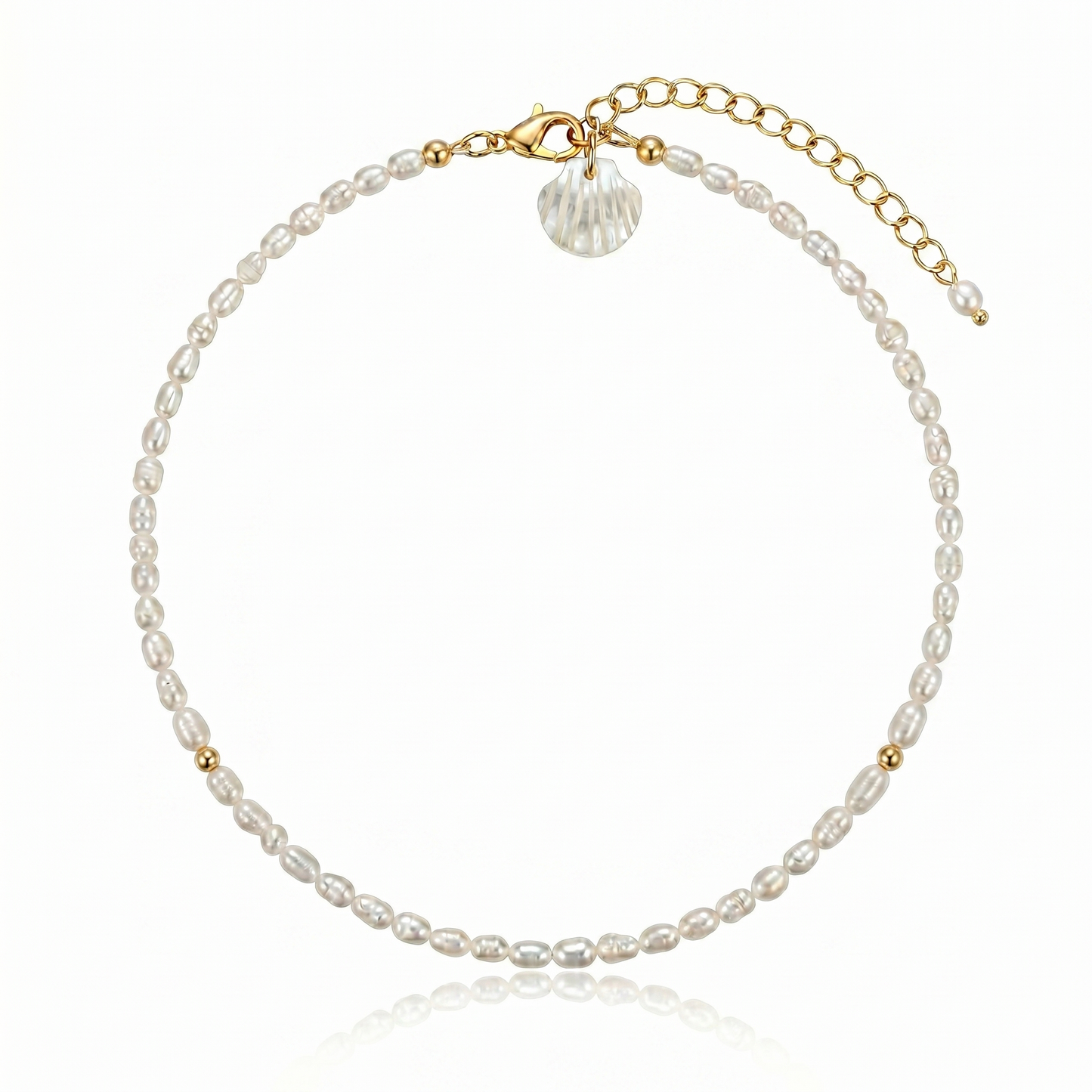 Freshwater pearl anklet with 5mm rice pearls, gold spacer beads, and shell charm
