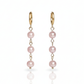 Island Dreams Earrings with blush pink seed pearl drops on gold huggie hoops.