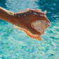 Horizon Hand Chain worn on hand – minimalist coastal hand jewelry from Charlotte’s Cove.