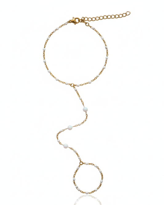 Horizon Hand Chain with white opal beads and delicate gold chain.