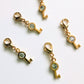 Pave key Charm