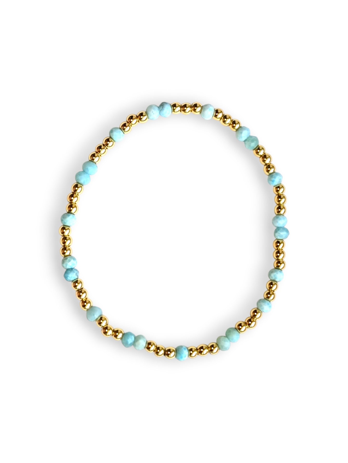 Larimar and gold-filled beaded stretch bracelet by Cappa Creations with calming ocean-inspired blue tones.