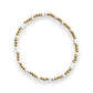 Close-up of white Howlite and gold-filled beaded stretch bracelet by Cappa Creations, handcrafted coastal jewelry.