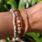 “Sunburnt Glow beaded bracelet stacked with other Sparkle Stacklers – Cappa Creations fall collection.”