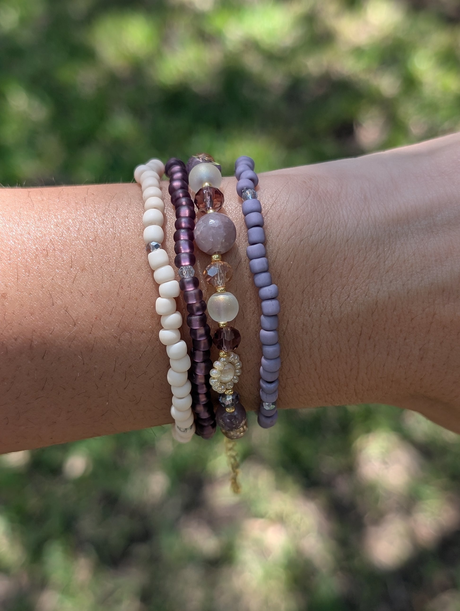 Amethyst Haze beaded bracelet stacked with other Sparkle Stacklers – Cappa Creations fall collection.”