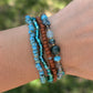 “Driftwood Turquoise beaded bracelet stacked with other Sparkle Stacklers – Cappa Creations fall collection.”