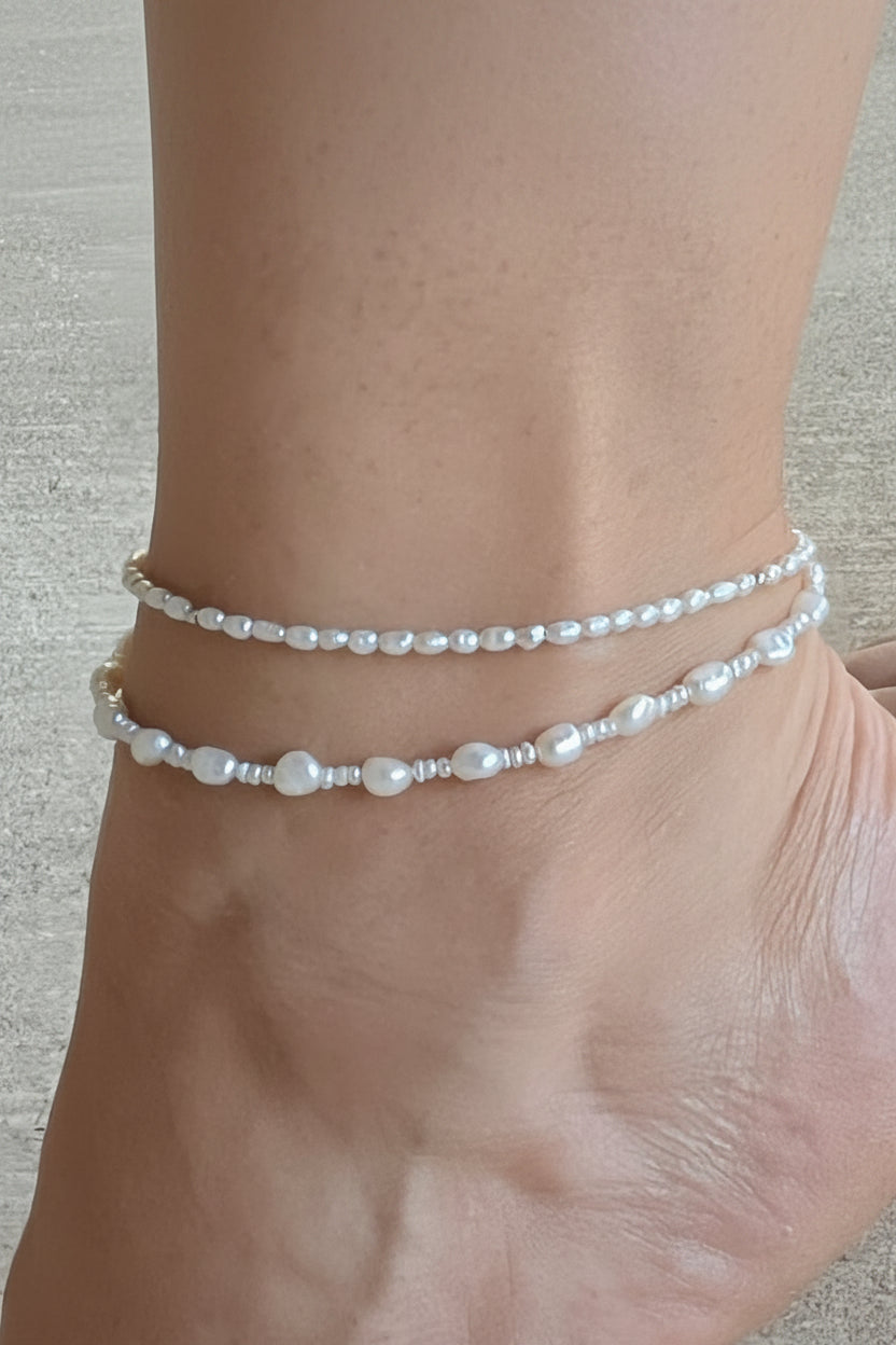 Close-up of mixed 3mm and 6mm freshwater pearl anklet with gold hardware