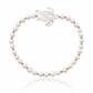 Honu Pearl Bracelet featuring genuine round freshwater pearls, polished 18K gold PVD spacer beads, and a hand-carved mother of pearl sea turtle centerpiece inspired by the treasured sea turtles of Hawaii.