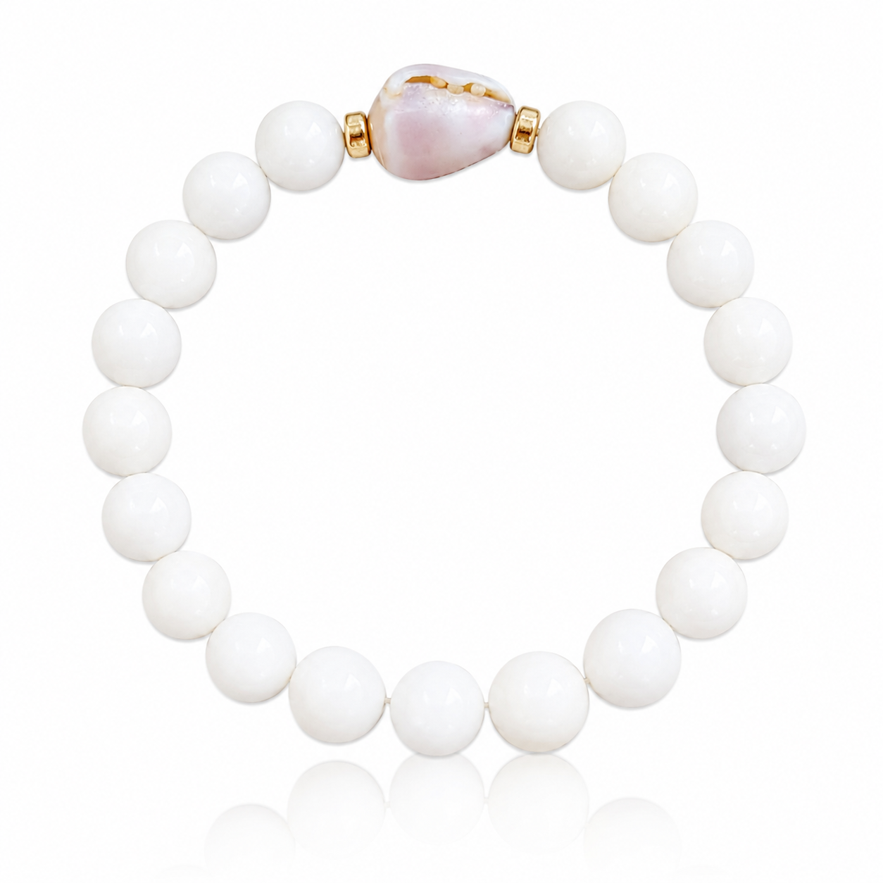 Lavender Bloom Bracelet featuring genuine polished white shell beads, a rare natural lavender cone shell centerpiece, and 14K gold-filled accent beads inspired by Hawaii's hidden beach treasures.