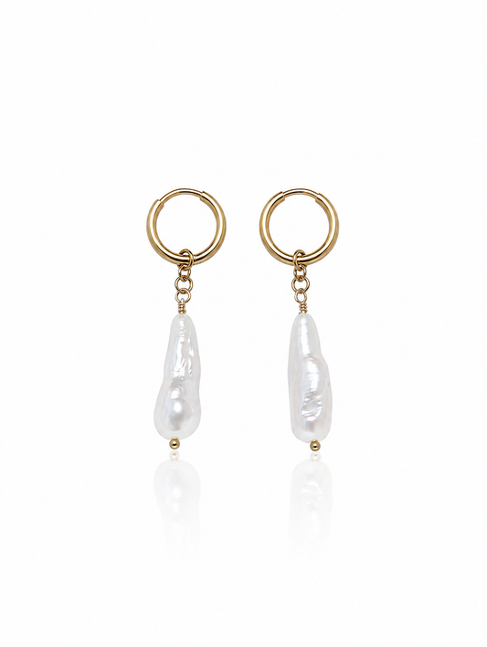 Ocean Pearl Earrings featuring genuine Biwa freshwater stick pearls suspended from polished 18K gold PVD hoop earrings for timeless coastal elegance.