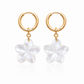 Hand-carved genuine mother of pearl plumeria flower earrings suspended from 18K Gold PVD stainless steel hoop earrings.