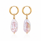 Rosé Resort Earrings with soft pink baroque pearls on gold huggie hoops.