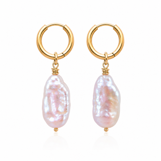 Rosé Resort Earrings with soft pink baroque pearls on gold huggie hoops.