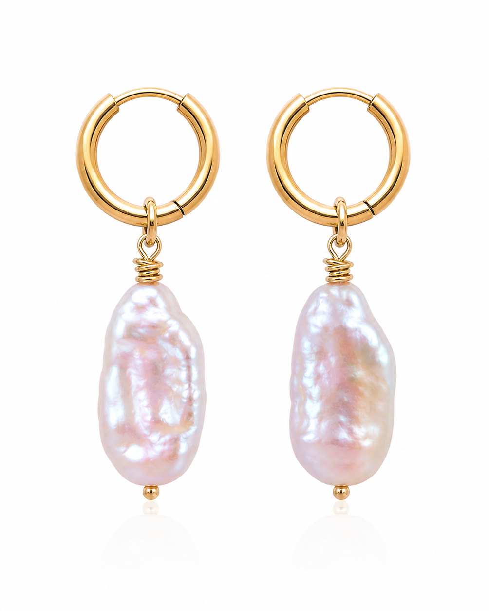 Gold hoop earrings with pink baroque pearls on a white background
