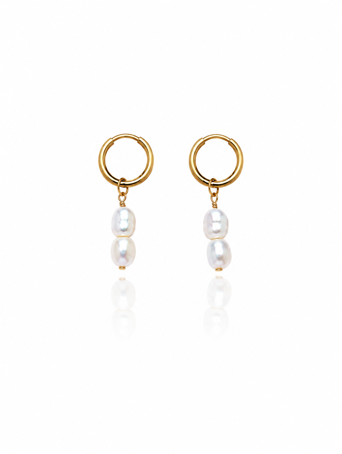 Salt Air Pearl Earrings featuring genuine freshwater pearl drops suspended from petite 18K gold PVD hoop earrings for timeless everyday coastal elegance.