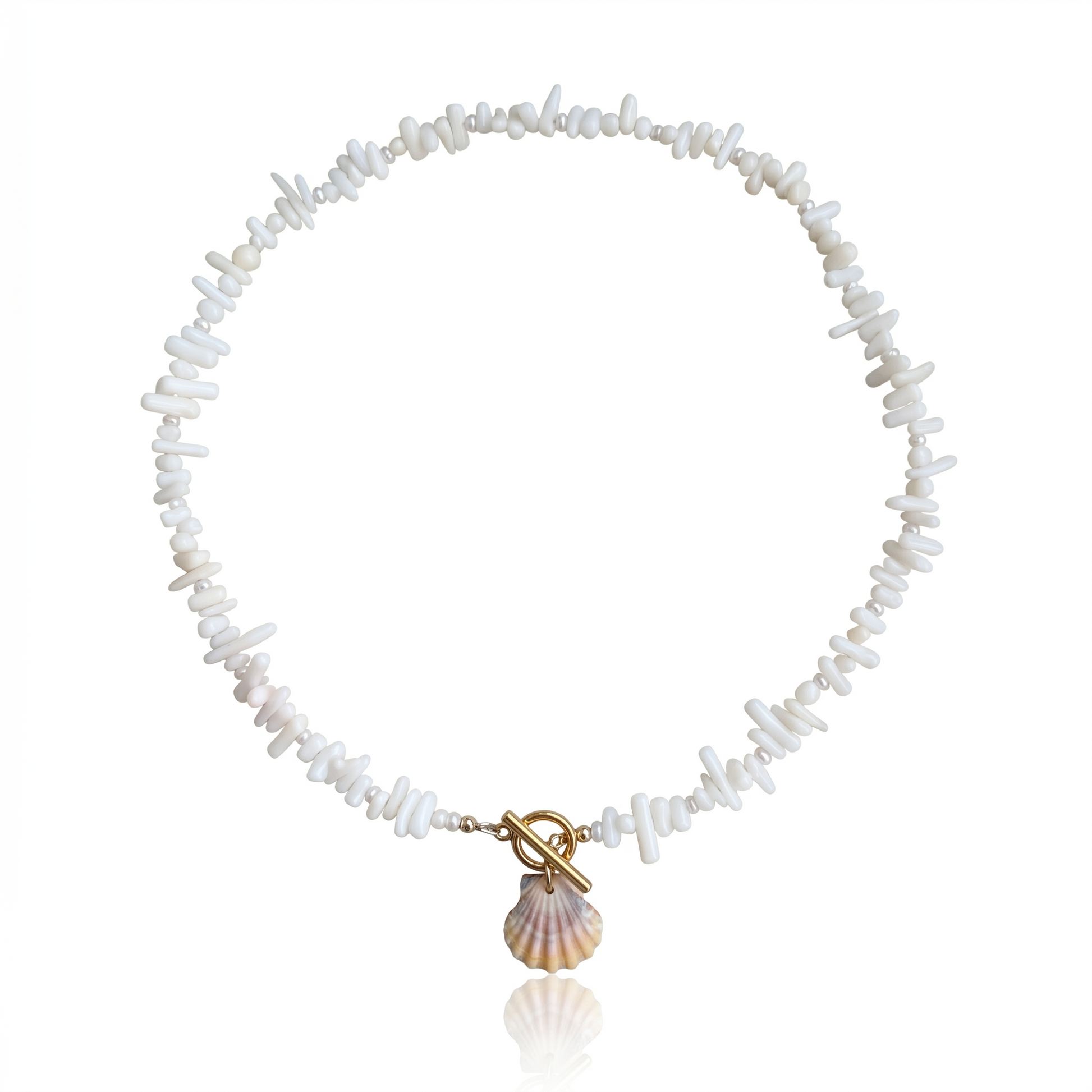 Hand-strung necklace featuring genuine coral chips, freshwater pearl accents, an authentic Hawaiian sunrise shell pendant, and an 18K Gold PVD toggle clasp inspired by the colors of Hawaiian sunrises.