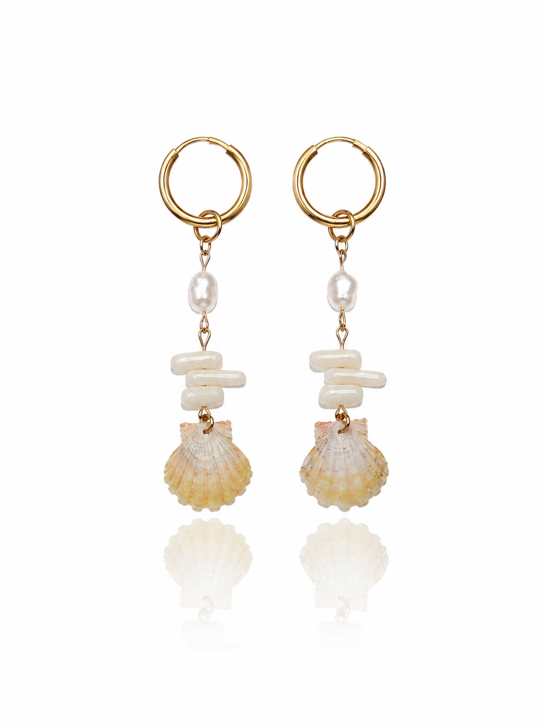 Sunrise Shell Coral Drop Earrings featuring genuine Hawaiian sunrise shells, natural coral chips, freshwater pearls, and 18K Gold PVD hoops inspired by the rare treasures of Hawaii.