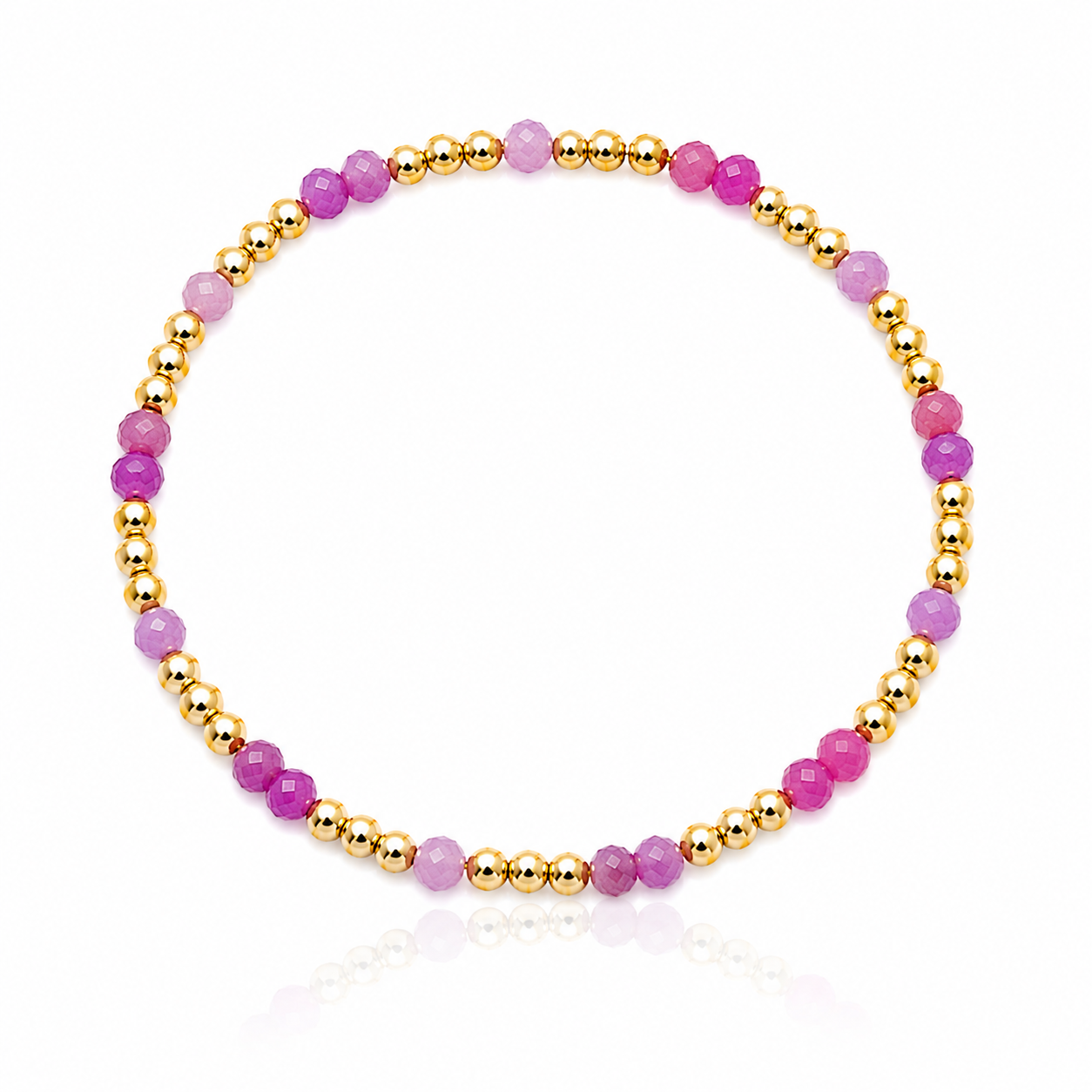 Pink Ruby Hibiscus Bracelet featuring genuine faceted pink ruby gemstones and polished gold-filled spacer beads inspired by tropical pink and purple sunsets.