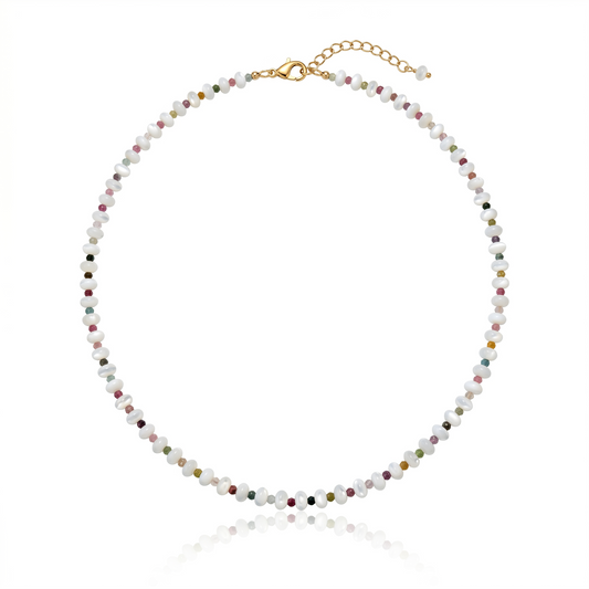 Hand-strung necklace featuring genuine mother of pearl rondelles, faceted watermelon tourmaline gemstones, and 18K Gold PVD hardware inspired by tropical coastal style.